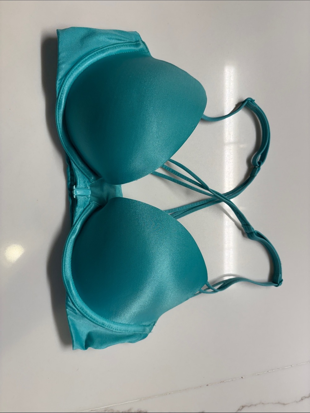 Victoria's Secret Teal Smooth Push-up Bra. Front close, cross back.